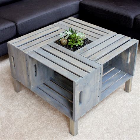 This zoria crate coffee table with metal dividers will add industrial style essence to any living room. DIY Wine Crate Coffee Table | Home and Heart DIY