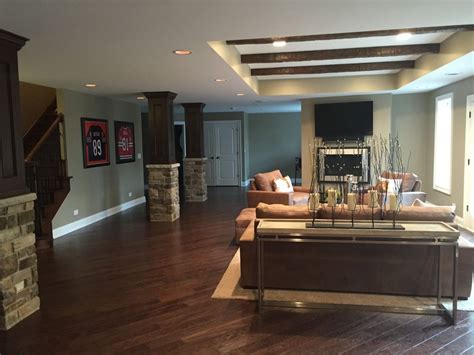 Others are painted the same color as the room, giving a calm accent to the entire area. Contemporary Basement with High ceiling, Exposed beam ...