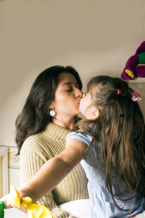 A Mother And A Babe Kissing Picture Image