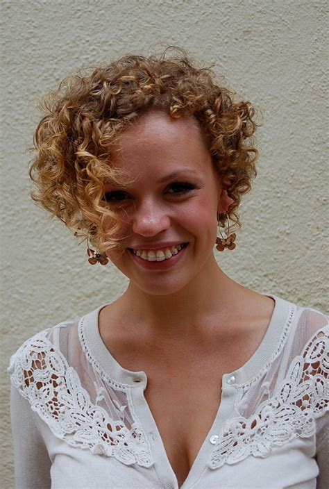 Cute Corkscrew Curls With V Shaped Nape Haircut
