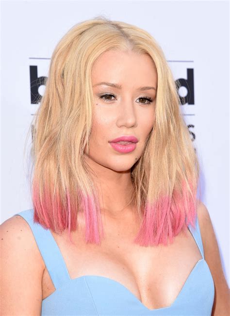 Black hair is a good base for the bright pink accentuation. Dip-dyed hair ideas: Our favourite A-list looks gallery