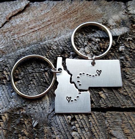 If you are in a long distance relationship and your girlfriend's birthday is approaching soon, worry not; Personalized State Keychain Set ANY 2 States hand stamped ...