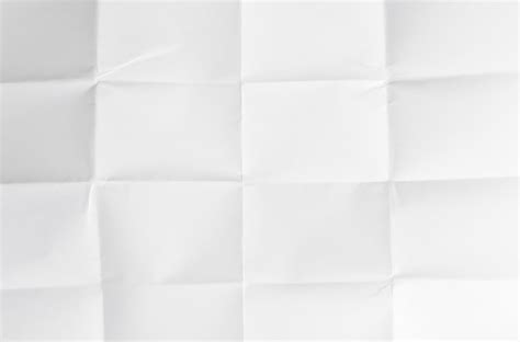 Premium Photo White Textured Sheet Paper Closeup