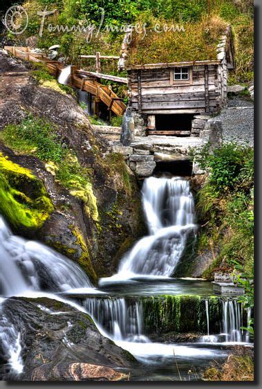 Guests are greeted by a lovely foyer that opens up to the main living area. Beautiful waterhouse and waterfall | Garden waterfall ...
