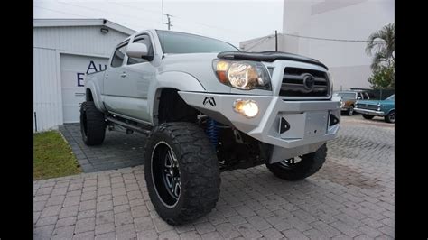 This Lifted And Trd Supercharged Toyota Tacoma 4x4 Pickup Truck Is