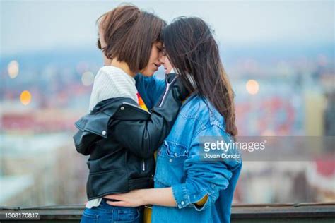 lesbian kiss stockfoto s en beelden getty images