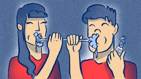 Two People Are Brushing Their Teeth With Toothpaste