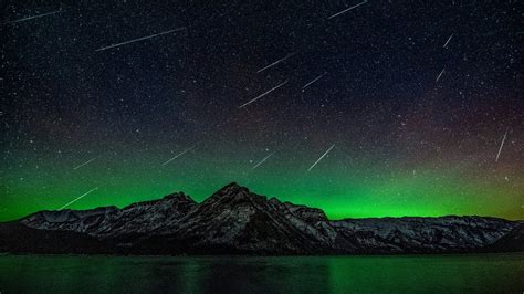 Northern Lights And Meteors At Lake Minnewanka In Banff Youtube