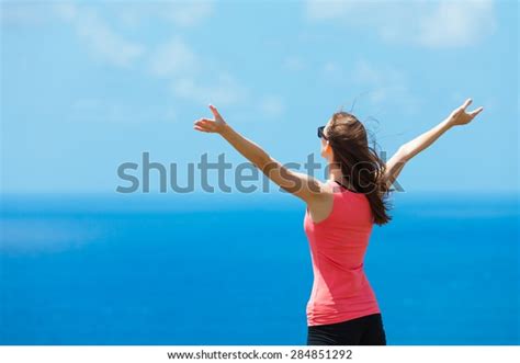 Womans Arms Raised Blue Sky Celebrating Stock Photo Shutterstock