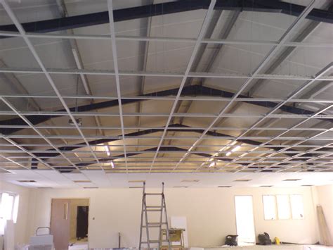 Drop ceilings (suspended ceilings) are a great option for basements vs drywall ceilings. LaserLine Ceilings & Partitions Devon Cornwall suspended ...