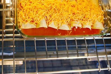 Use two forks to shred chicken. easy sour cream and chicken enchiladas, modified from the ...