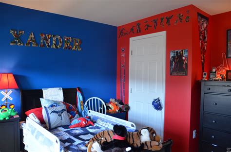 Red Blue Superhero Theme Boys Bedroom With Red And Blue Walls Featuring