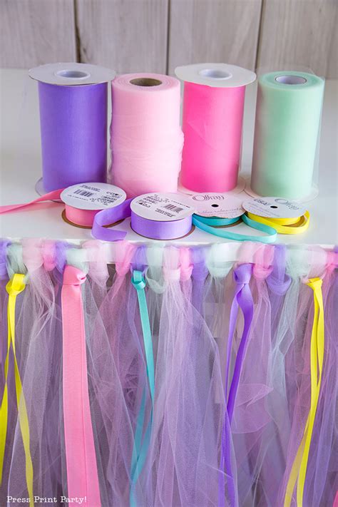 Krystal, on august 3, 2015 at 11:52 am posted in do it yourself 1 42. No-Sew Tulle Table Skirt Tutorial w. ribbons (EASY) - Press Print Party!