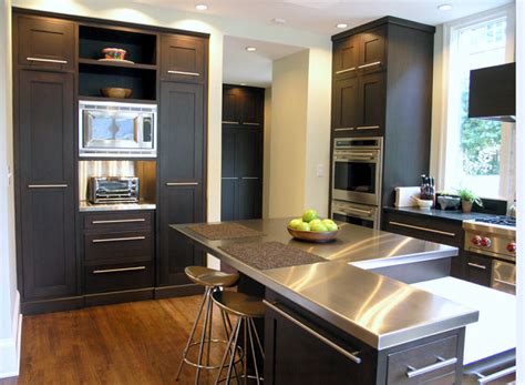 I also have dark brown cabinets and black silestone countertops with stainless steel appliances. 15 Kitchens With Stainless Steel Countertops