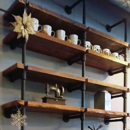 High quality wrought iron corbels and iron shelf brackets. Industrial Chic Iron Pipe Shelving is Custom - Fixtures ...