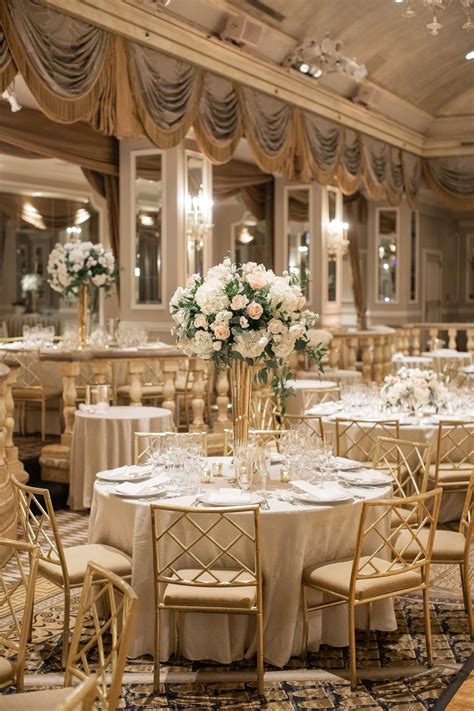 Elegant Nyc Ballroom Wedding With Towering Floral Centerpieces At The