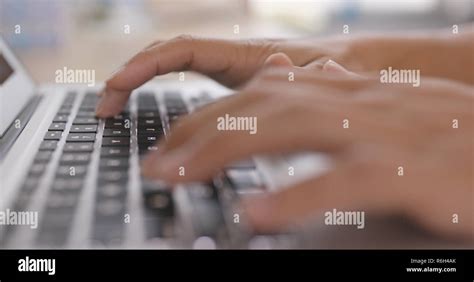 Typing On Notebook Computer Stock Photo Alamy