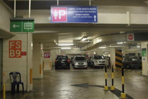 The car parking lot is located nearby a hotel. Men muscle in on women-only parking bays | CarSifu
