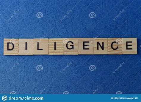 Text On Gray Word Diligence In Small Wooden Letters Stock Photo Image