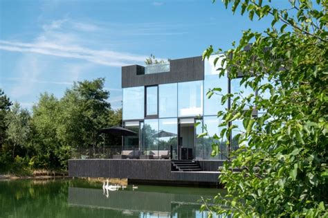 Mecanoo Unveils Stunning Glass Lake House That Harmonizes With Nature