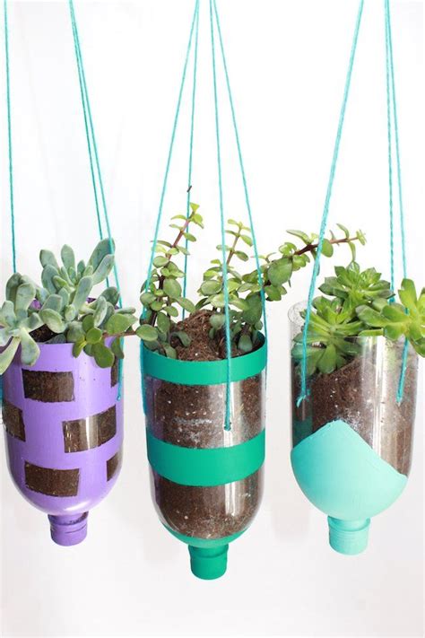 How To Make Hanging Planters From Recycled Water Bottles Diy Hanging