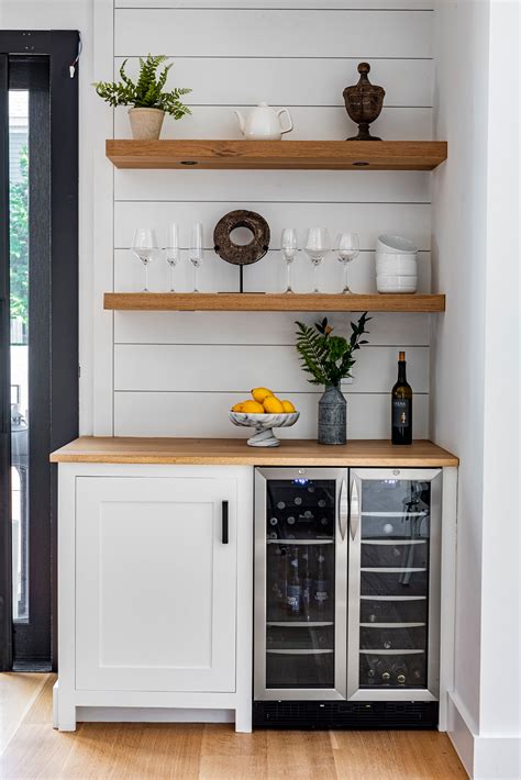 Design ideas for a small contemporary single wall home bar in berkshire with no sink flat panel cabinets dark wood cabinets mirror splashback beige floors and white worktops. Mini Bar Ideas For Small Spaces : 75 Beautiful Small Home ...