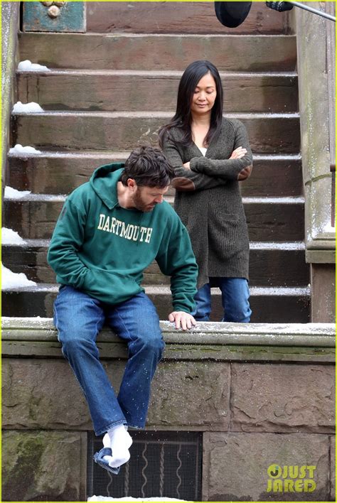 Casey Affleck Hong Chau Enjoy A Moment Together While Filming The Instigators With Matt