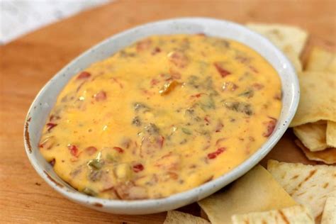 Add ground beef, tomatoes and a few other ingredients—and enjoy! Crock Pot Ro-Tel Dip With Ground Beef and Cheese | Recipe ...