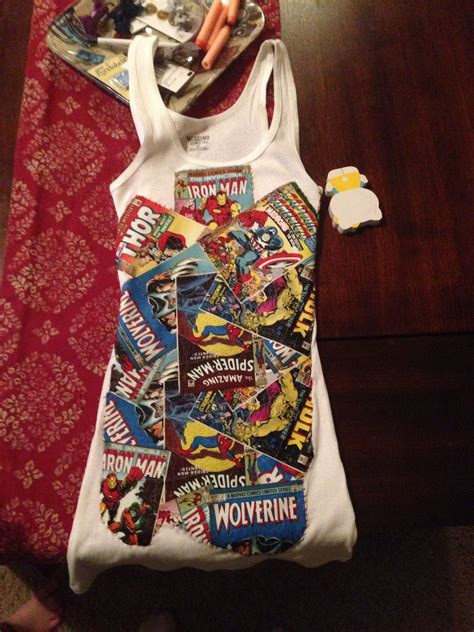 Ive threaded the machine and the bobbin correctly with sturdy thread, presser foot up with a sharp and, the bobbins that are sold as 66 bobbins in the fabric store are no good for this old machine. White tank top, comic book fabric, wonder under, iron, and ...