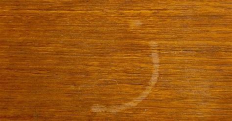 Window cleaner can help get rid of hard water stains. How to Remove Water Stains From Wood | Hometalk
