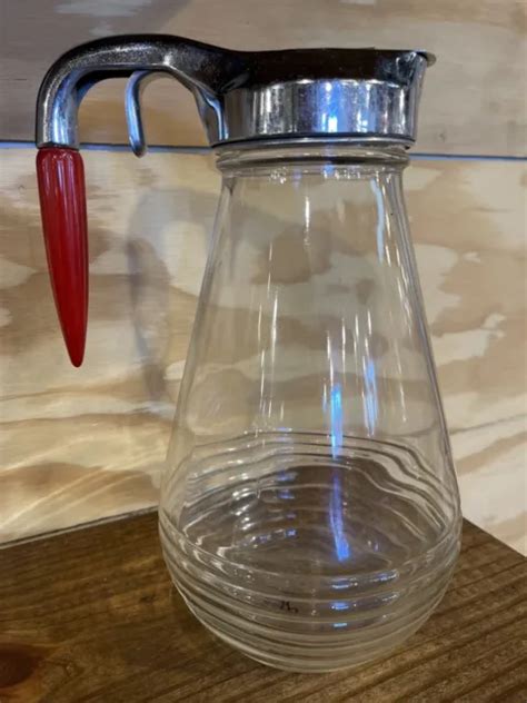 VINTAGE HAZEL ATLAS Glass Juice Syrup Pitcher Jar W Red Bakelite Bullet
