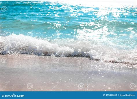 Beautiful Scenery Of Sea Waves Lapping On The Shore Of The Beach On Sunny Day Stock Image