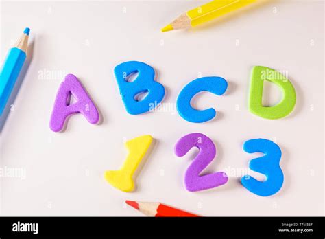 Alphabet Letters And Numbers Over A Kids Desk Stock Photo Alamy