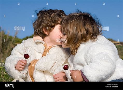 Children Kissing Stock Photo Alamy