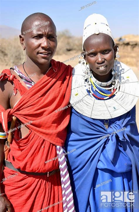 Maasai Man And A Woman Wearing Traditional Dress Ngorongoro Conservation Area Ndema Tanzania