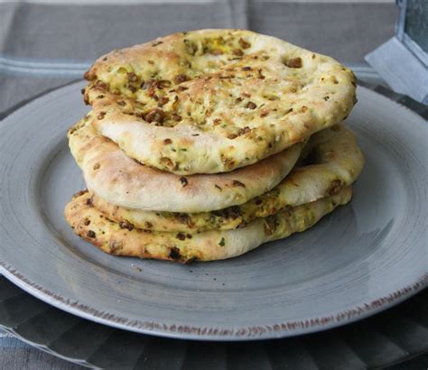 Both the flatbreads and the topping can be made in advance. Middle eastern flatbread filled with lamb and herbs ...
