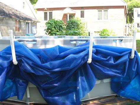 Above ground pool solar cover holder the first easy handling and storage system for solar pool covers! 46 best Above Ground and Soft Sided Pools images on ...