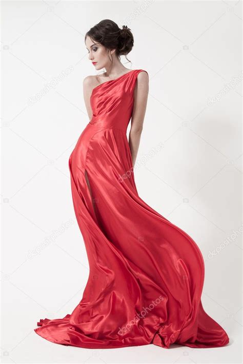 Young Beauty Woman In Fluttering Red Dress Stock Photo By