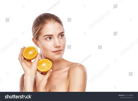Beautiful Womans Face Orange Close Studio Stock Photo 1215156892