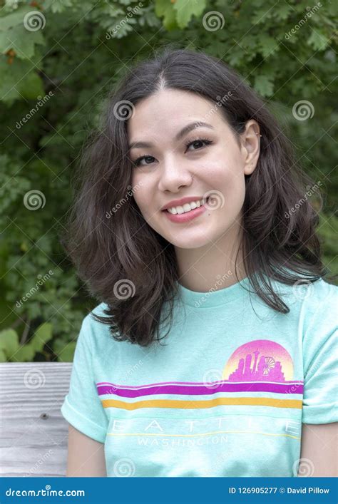 Twenty One Year Old Strikingly Beautiful Amerasian Woman Posing In