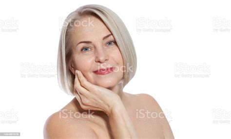 Beautiful Middleaged Blonde Woman Shows Off Her Perfectly Wellgroomed Face Macro Face Realistic