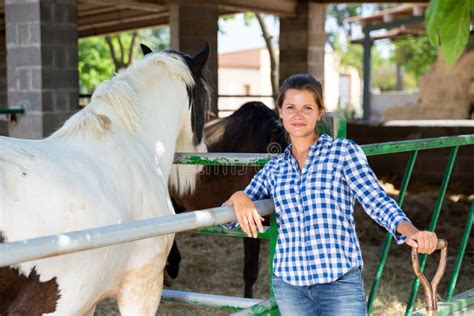 Happy Woman Horses Breeder Near Stable Stock Photo Image Of Horse