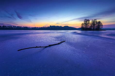 Frozen Lake At Sunrise Or Sunset Winter Tranquil Landscape Stock