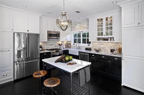 L Shaped Kitchen Features White Upper Cabinets And Black Lower Cabinets