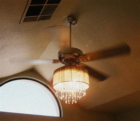 Ceiling fan with chandelier light kit. Addicted to House Redressing and Other Musings: Why not a ...