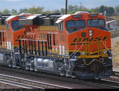 Bnsf 6650 And Her Sister Bnsf 6648 Head West As Rear Dpu Units On Their