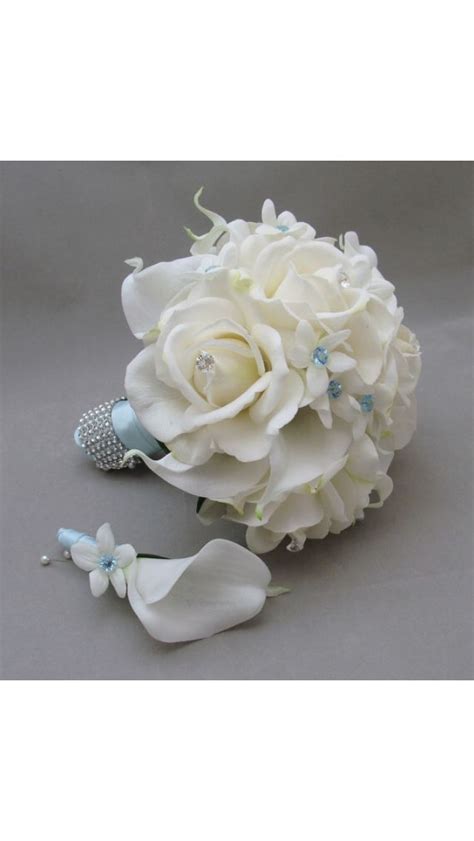 Traditional wedding wisdom says that blue is the requisite good luck shade for brides. Prom flowers! | Wedding flower design, Blue wedding ...