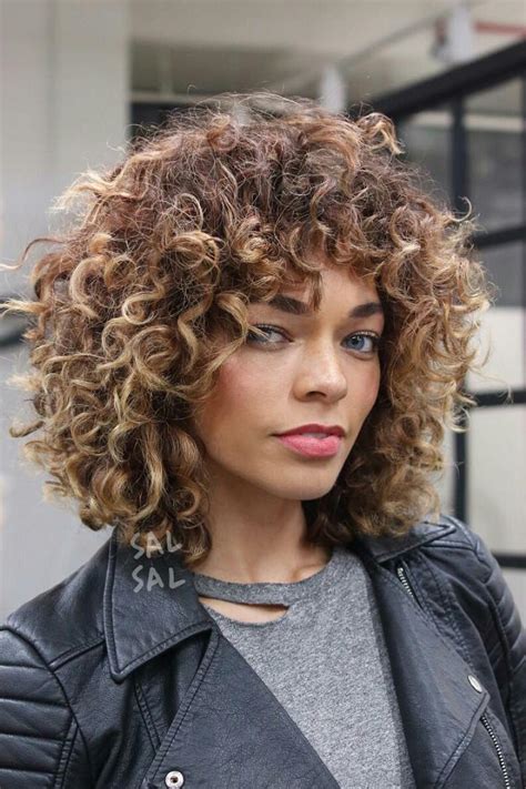 These haircuts both suit longer curly hair because they allow more layers to include more curls around the sides. Medium Haircut Inspiration for 2018 - Southern Living