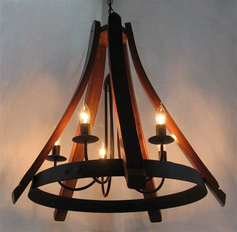 Custom made iron black and rusted chandeliers, tin metal lights, and ceiling illumination for foyer, and living room. Buy a Hand Made Cervantes, Wine Barrel Chandelier Recycled ...