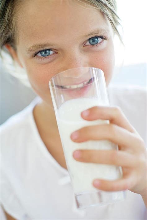 Girl Drinking Milk Photograph By Ian Hooton Science Photo Library Pixels